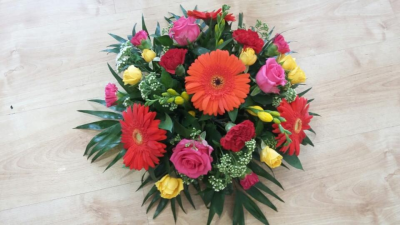 Vibrant Posy Tribute - A beautiful mix of vibrant, bright, beautiful flowers. A lovely tribute to someone special. 