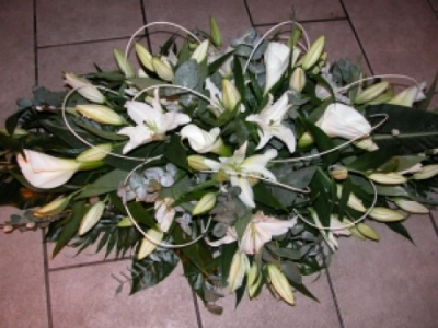 Tribute 04 - Selection of beautiful cream and green flowers double ended spray including callas and liles (if available)