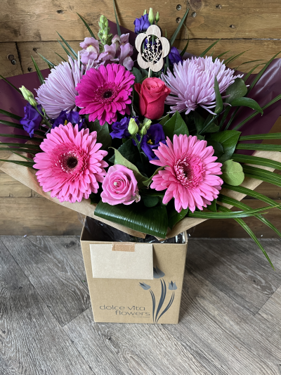 Pink Delight - This bouquet will be a lovely mix of shades of pink flowers. It will be come in a presentation box with food and water for longer lasting stems. You can choose a different amount to spend if you prefer as long as it is above the minimum amount.